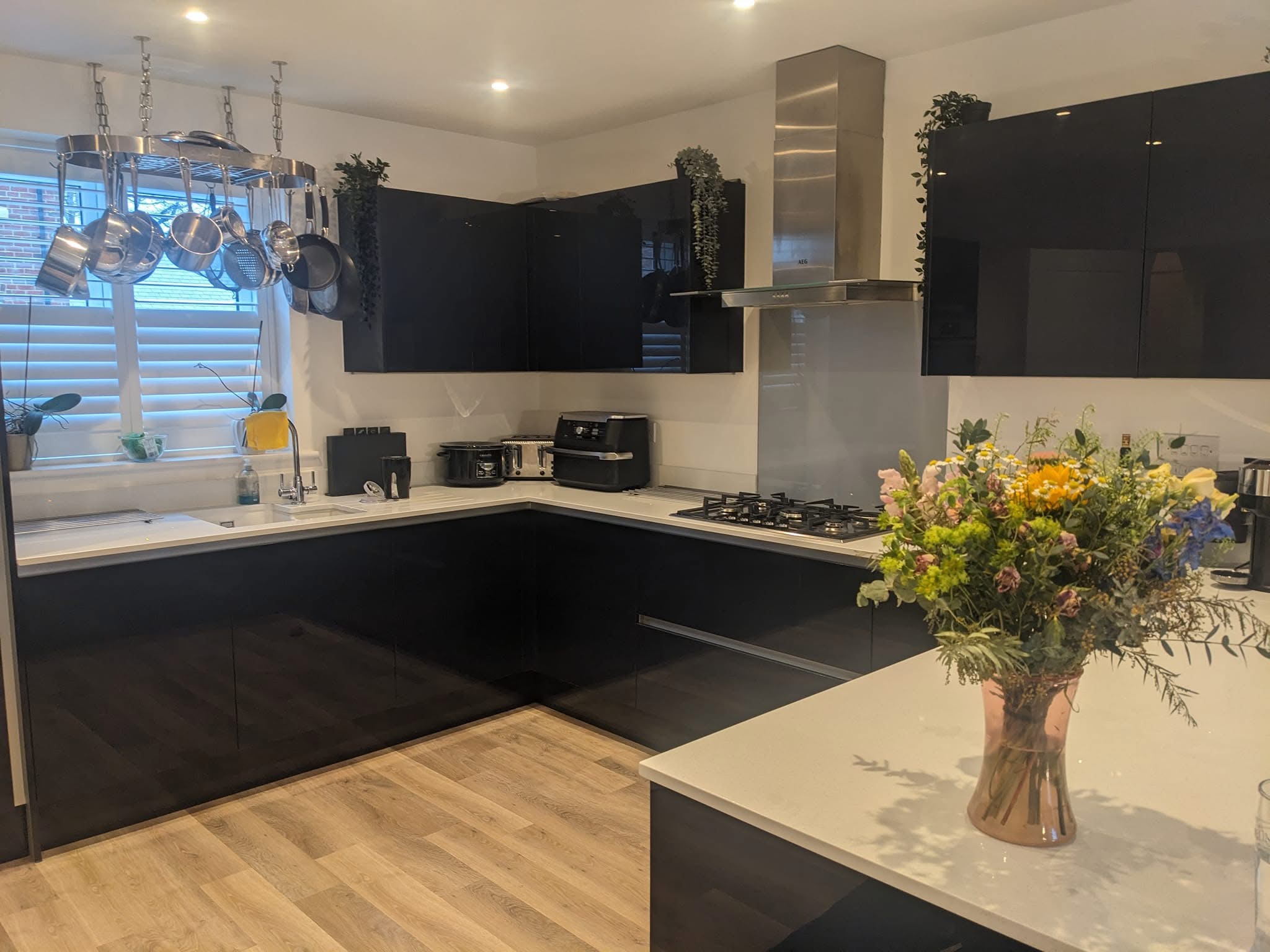 Kitchen after deep clean — sparkling surfaces and hob