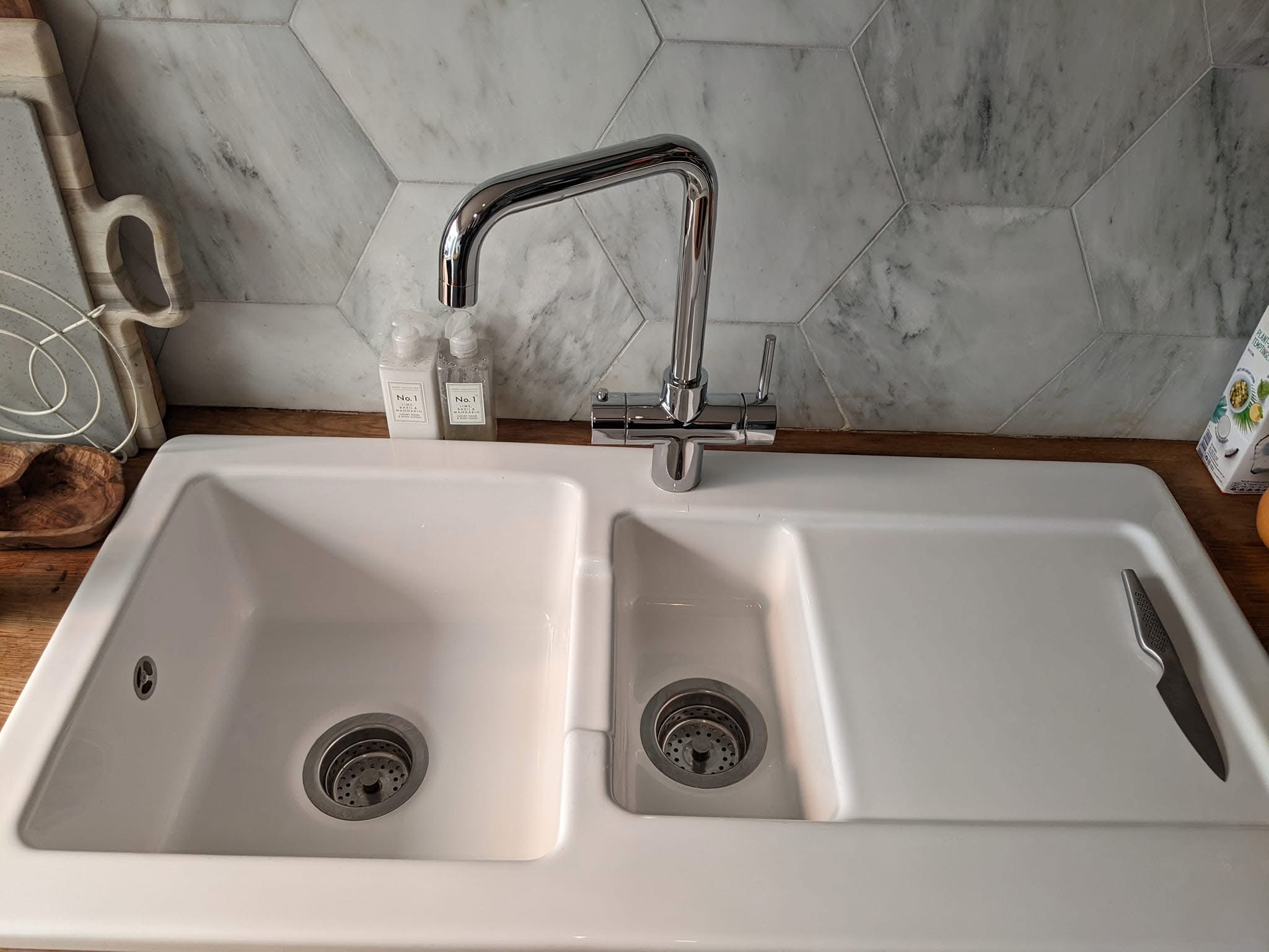 Kitchen sink after cleaning — spotless finish