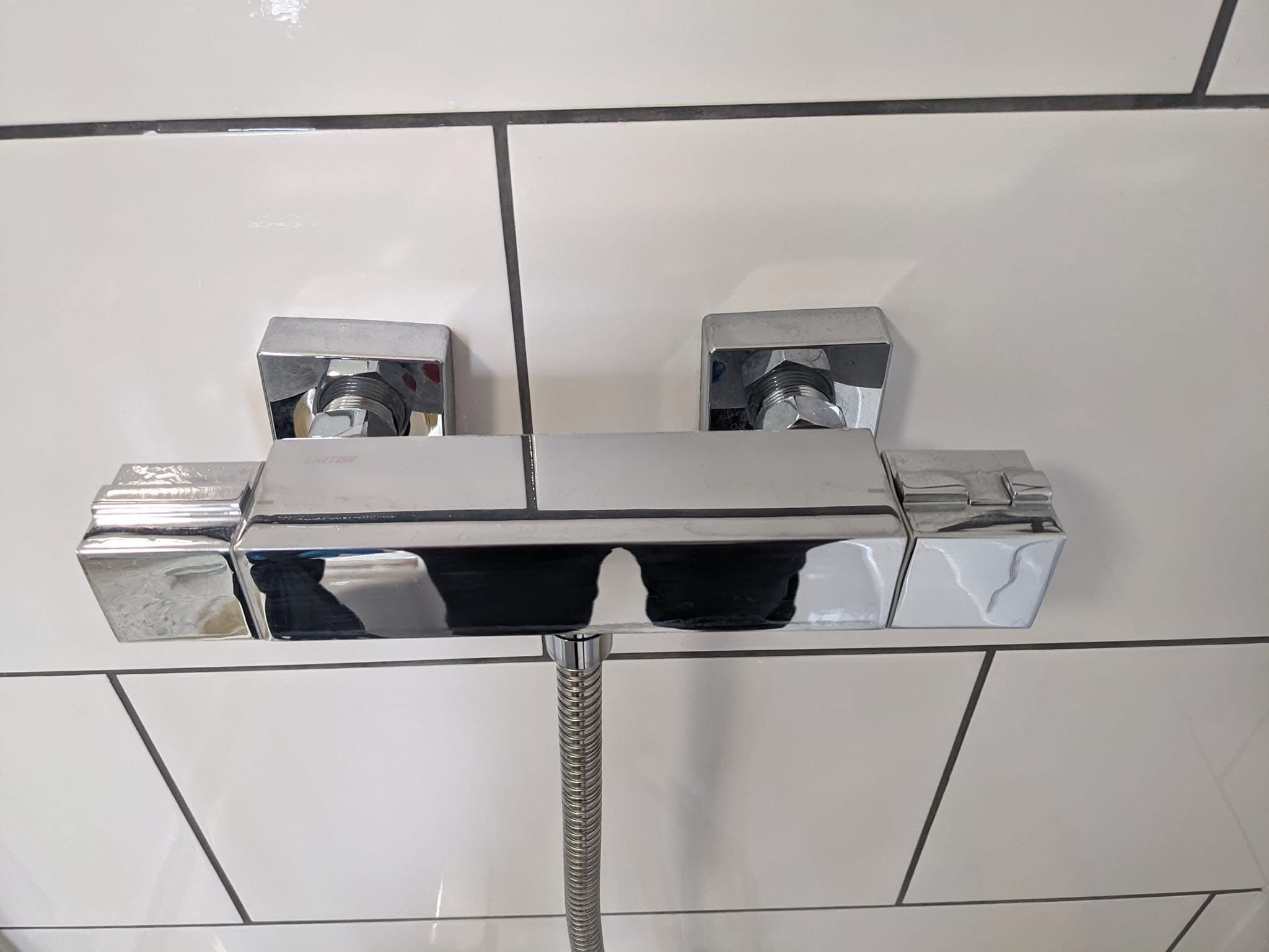 Shower cubicle after deep clean — crystal clear